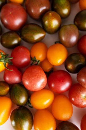 Colorful cherry tomatoes on white background. close up. selective focus.の写真素材