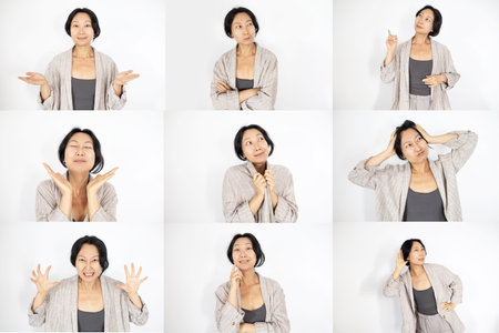 Set of different facial expressions and gestures of a middle-aged Asian womanの写真素材
