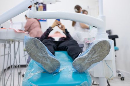 man patient waiting on stretcher in dental clinic.の写真素材