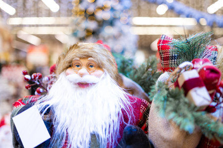Santa Claus doll in Christmas market. Christmas and New Year concept.の写真素材