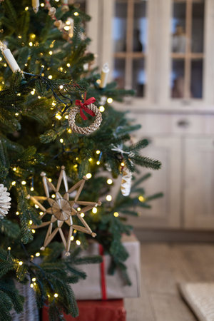 Decorated Christmas tree in the interior of the living room.の写真素材