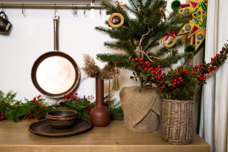 Decorated Christmas living room with a wicker basket on the tableの写真素材
