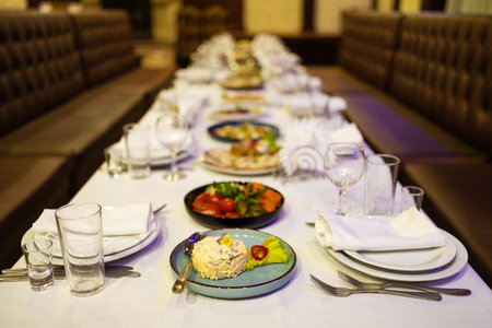 Table set for wedding or another catered event dinner in a restaurant