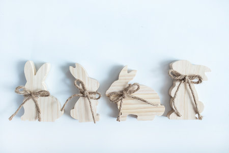 Easter toys. Wooden rabbit isolated on white background. copy space.の写真素材