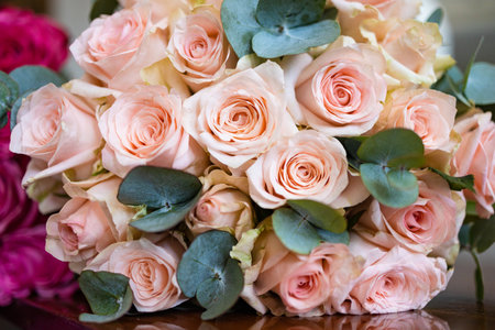 wedding bouquet of pink roses with eucalyptusの写真素材