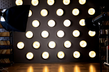 Photo background with modern lights and professional equipment inside modern studioの写真素材