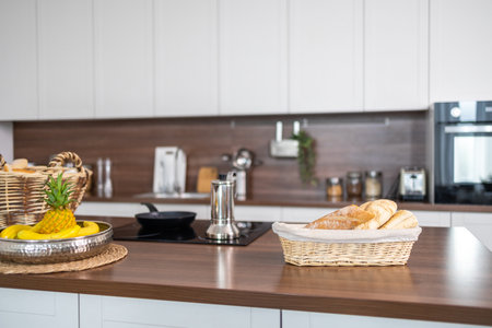 Empty wicker basket with food on the countertop in modern kitchen