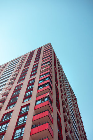 Modern apartment buildings on a sunny day with a blue sky. Facade of a modern apartment building