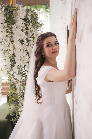 Portrait of a beautiful bride in a white wedding dress. Wedding dressの写真素材