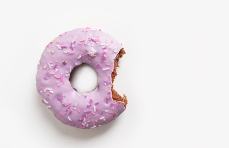 Donuts isolated set. Fresh donut, bitten and half a donut on a white background. Top view. Flat lay.の写真素材