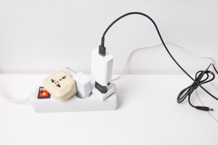 Power plug and socket on a white background. Power supply concept.