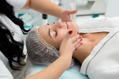 Cosmetic massage, facial treatment.の写真素材