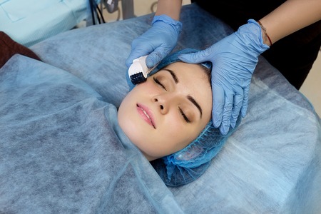 Mesotherapy face by mezoroller.の写真素材