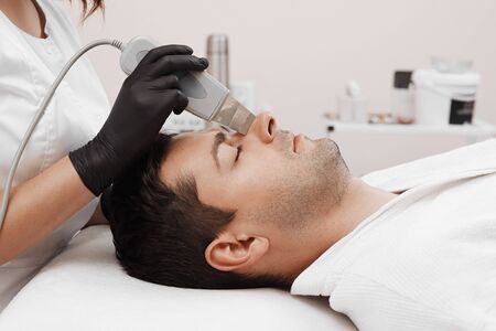 Ultrasonic face scrubber close up.の写真素材