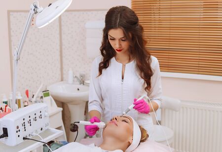 Ultrasound cavitation procedure. Anti-aging, lifting procedure.の写真素材