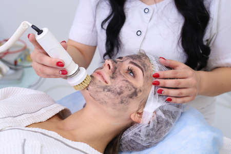 Hardware cosmetology. Cleaning the skin with a brush.の写真素材