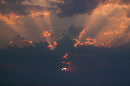 Sun burning through the clouds の写真素材