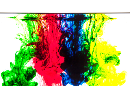 Color clouds flowing underwater isolated on a white backgroundの写真素材