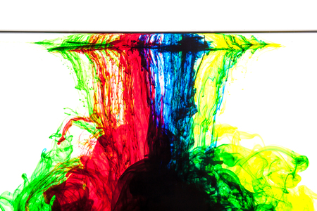 Color clouds flowing underwater isolated on a white backgroundの写真素材