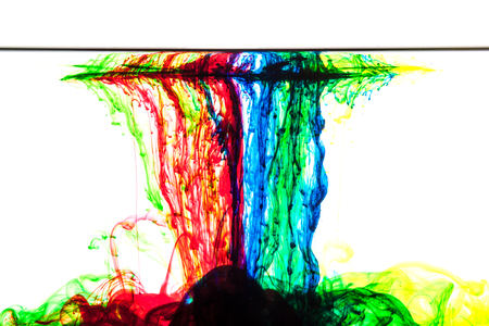 Color clouds flowing underwater isolated on a white backgroundの写真素材