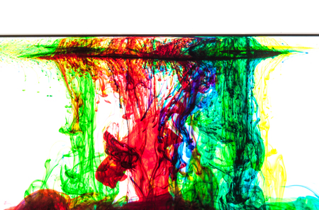 Color clouds flowing underwater isolated on a white backgroundの写真素材