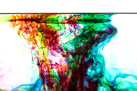 Color clouds flowing underwater isolated on a white backgroundの写真素材