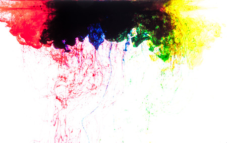 Color clouds flowing underwater isolated on a white backgroundの写真素材