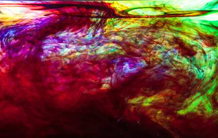 Color clouds flowing underwater isolated on a white backgroundの写真素材