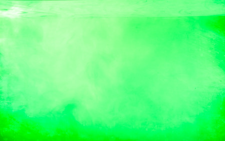Color clouds flowing underwater isolated on a white backgroundの写真素材