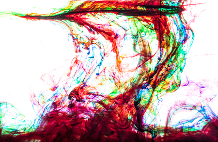 Color clouds flowing underwater isolated on a white backgroundの写真素材