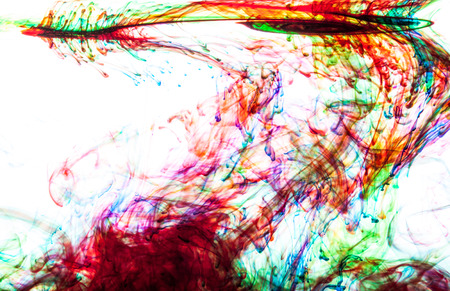 Color clouds flowing underwater isolated on a white backgroundの写真素材