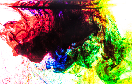 Color clouds flowing underwater isolated on a white backgroundの写真素材