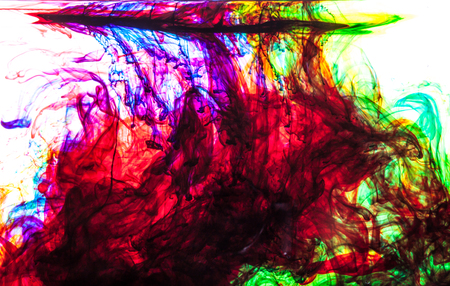 Color clouds flowing underwater isolated on a white backgroundの写真素材