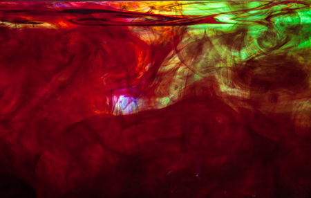 Color clouds flowing underwater isolated on a white backgroundの写真素材
