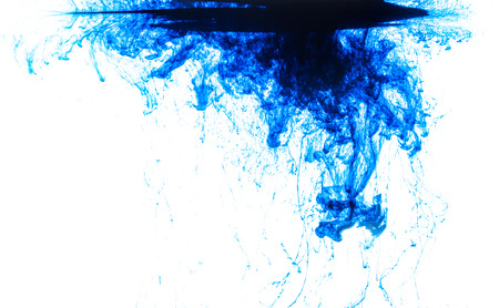 Color clouds flowing underwater isolated on a white backgroundの写真素材