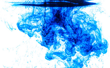 Color clouds flowing underwater isolated on a white backgroundの写真素材
