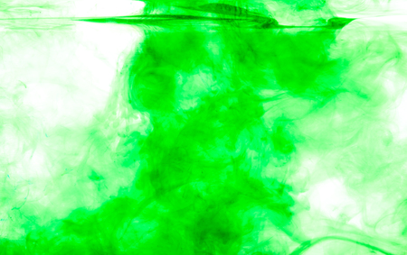 Color clouds flowing underwater isolated on a white backgroundの写真素材