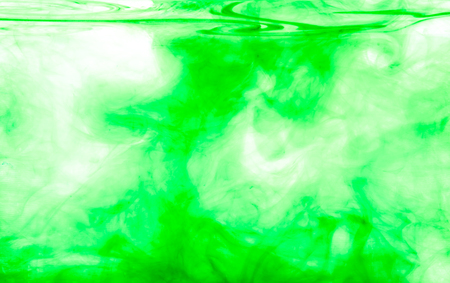 Color clouds flowing underwater isolated on a white backgroundの写真素材