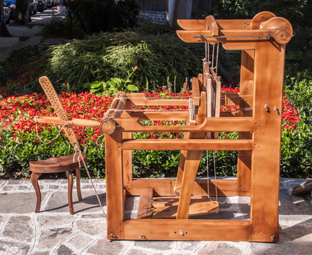 Antique loom machine. Bulgarian traditional culture.の写真素材