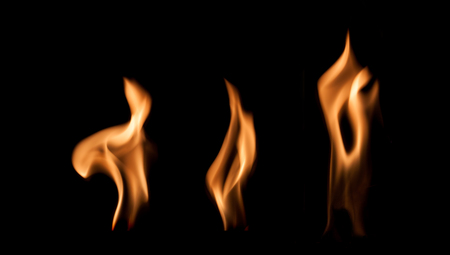 Fire flames isolated on a black backgroundの写真素材