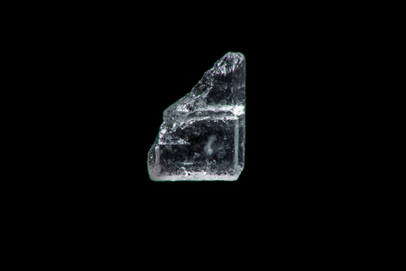 Extreme macro photography of sugar crystal on a black backgroundの写真素材