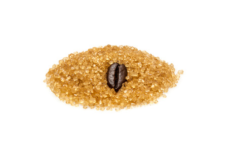 Coffe bean burrowed in a pile of brown sugar, isolated on white backgroundの写真素材