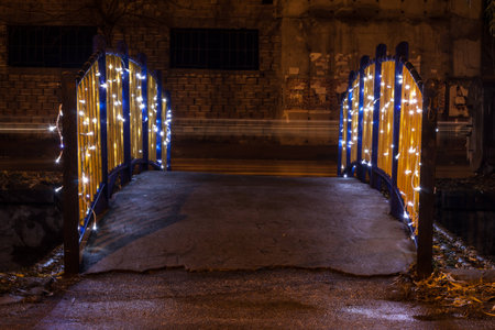 A bridge decorated with christmas lightsの写真素材