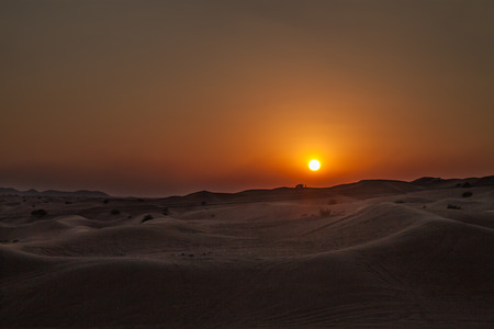 Majestic sunset during the safari in the desertの写真素材
