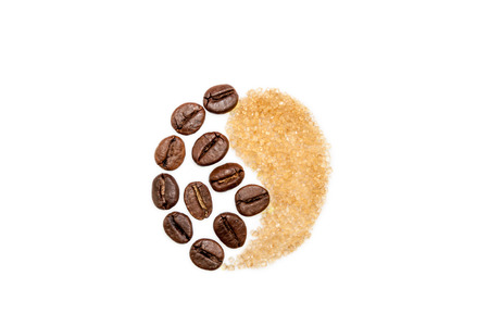 Yin and Yang Symbol made from coffee beans and brown sugarの写真素材