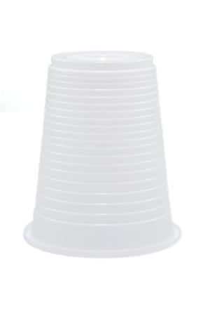 White and ribbed plastic cup isolated on whiteの写真素材