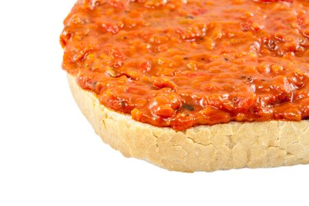 Traditional Bulgarian relish called Lutenica. Spread on a slice of white bread.の写真素材