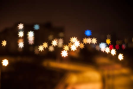 Star shape qustom bokeh. City street lights.の写真素材