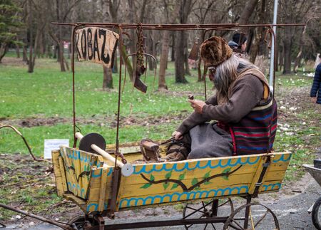 YAMBOL, BULGARIA - MARCH 08, 2015 - Kukerlandia - mask festival and masquerade games 08 March 2015. Bulgarian traditional dances and costumes called Kukeri.のeditorial素材