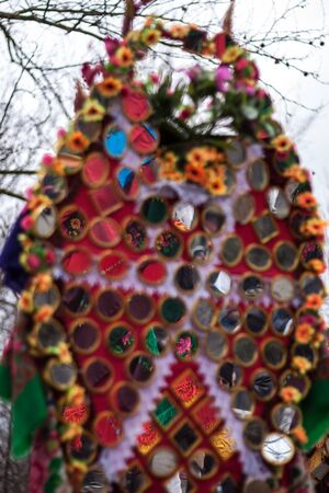 YAMBOL, BULGARIA - MARCH 08, 2015 - Kukerlandia - mask festival and masquerade games 08 March 2015. Bulgarian traditional dances and costumes called Kukeri.のeditorial素材